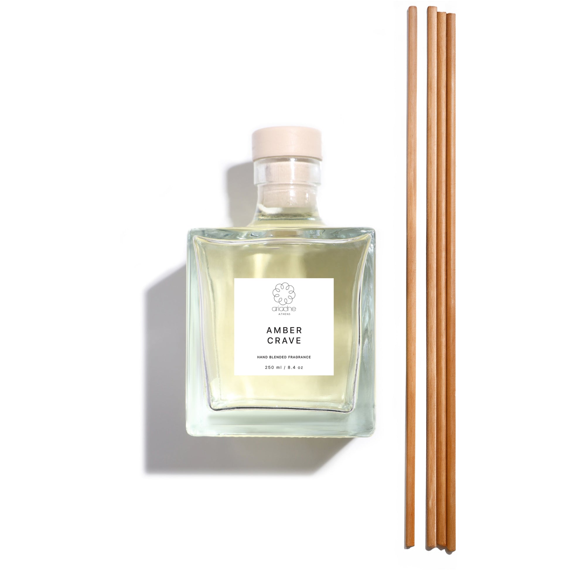 The Amber Crave Diffuser with its sticks front side