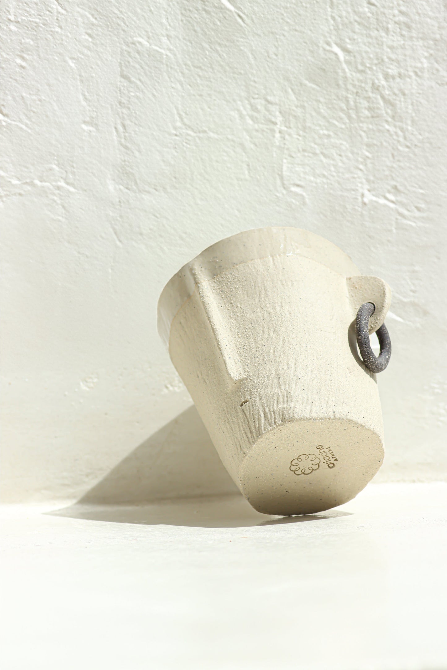 A Cycladic Art Mug side view.