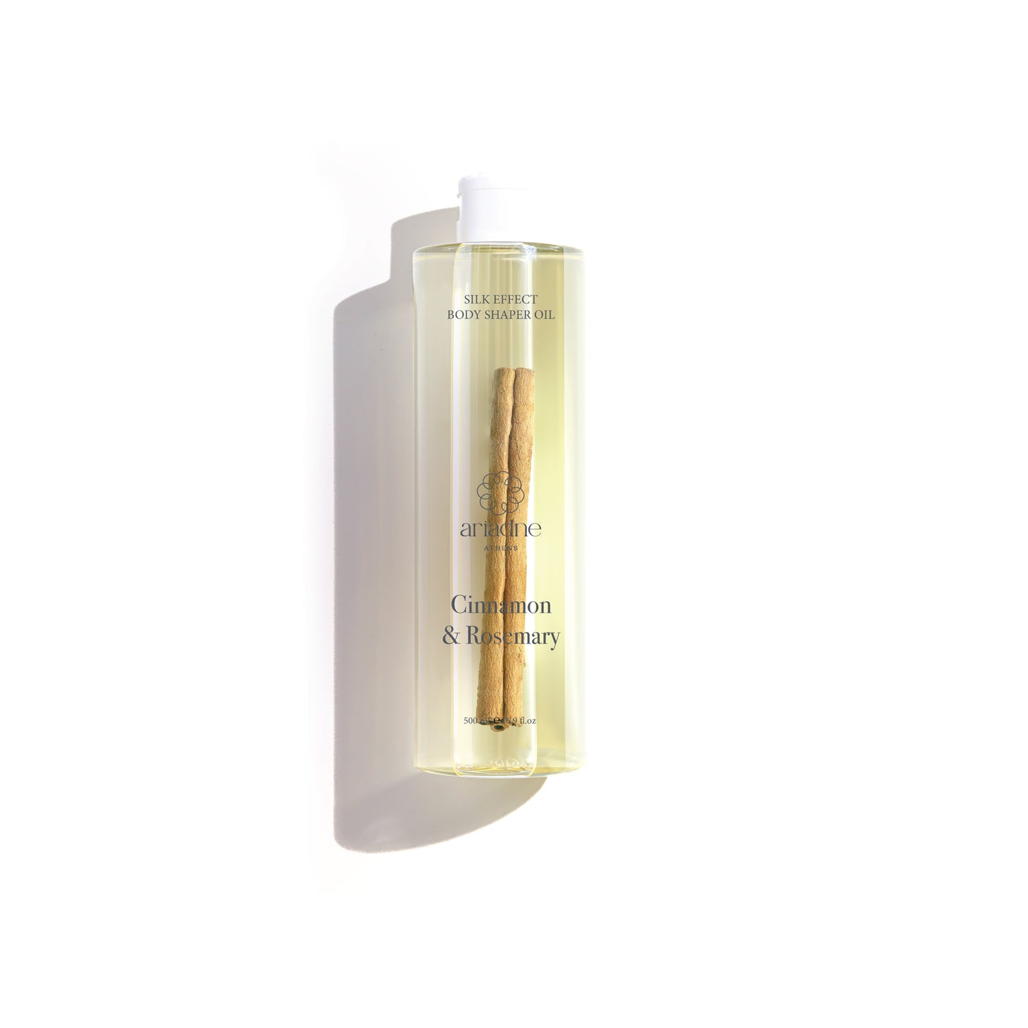 Cinnamon & Rosemary Oil bottle front side.